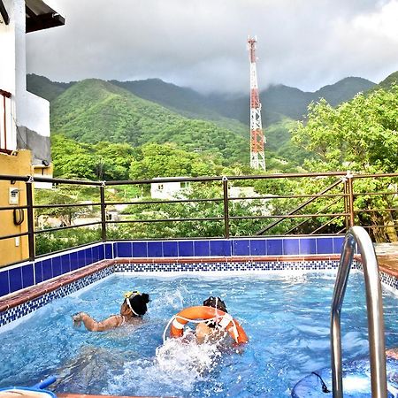 Hostal Rancho Aparte ตากังกา ภายนอก รูปภาพ