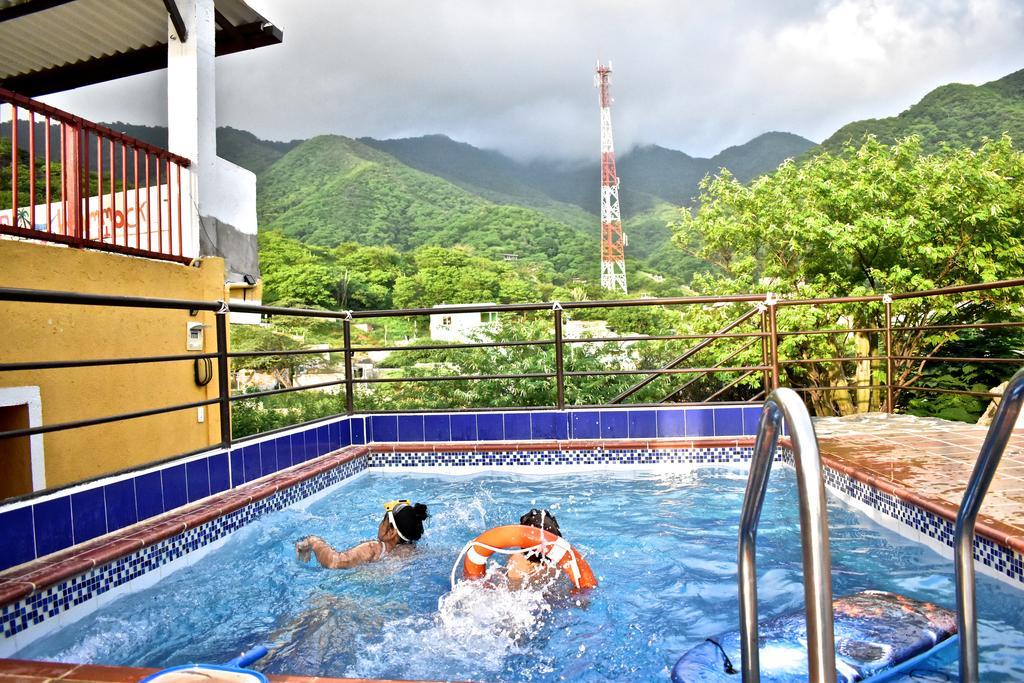 Hostal Rancho Aparte ตากังกา ภายนอก รูปภาพ
